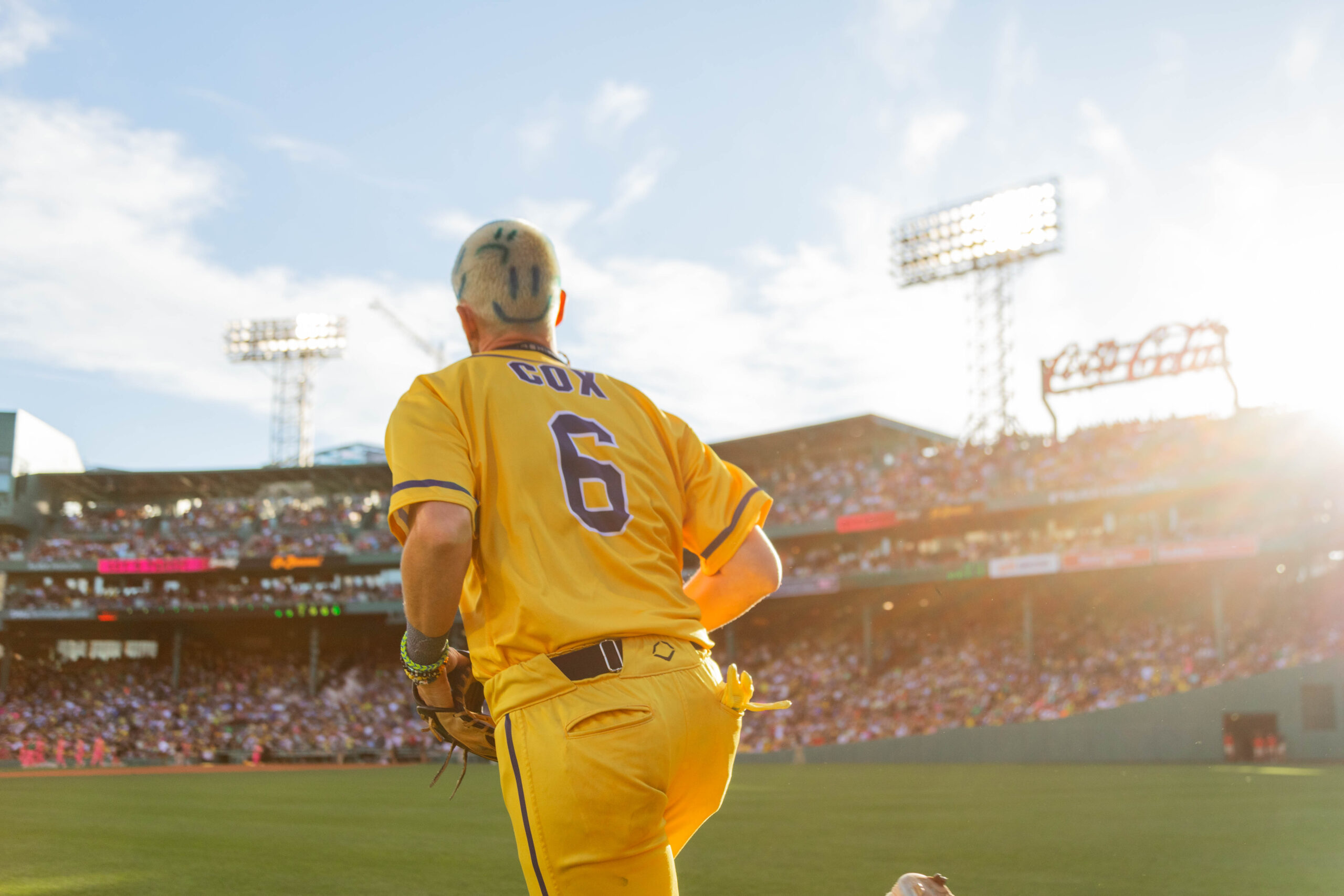 Ryan Cox running onto field at Fenway Park